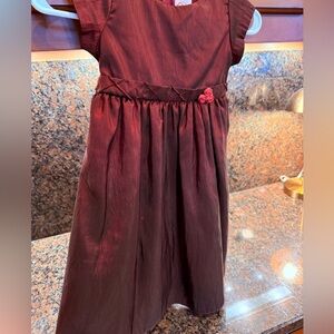 Elegant Burgundy Dress with Floral Accent